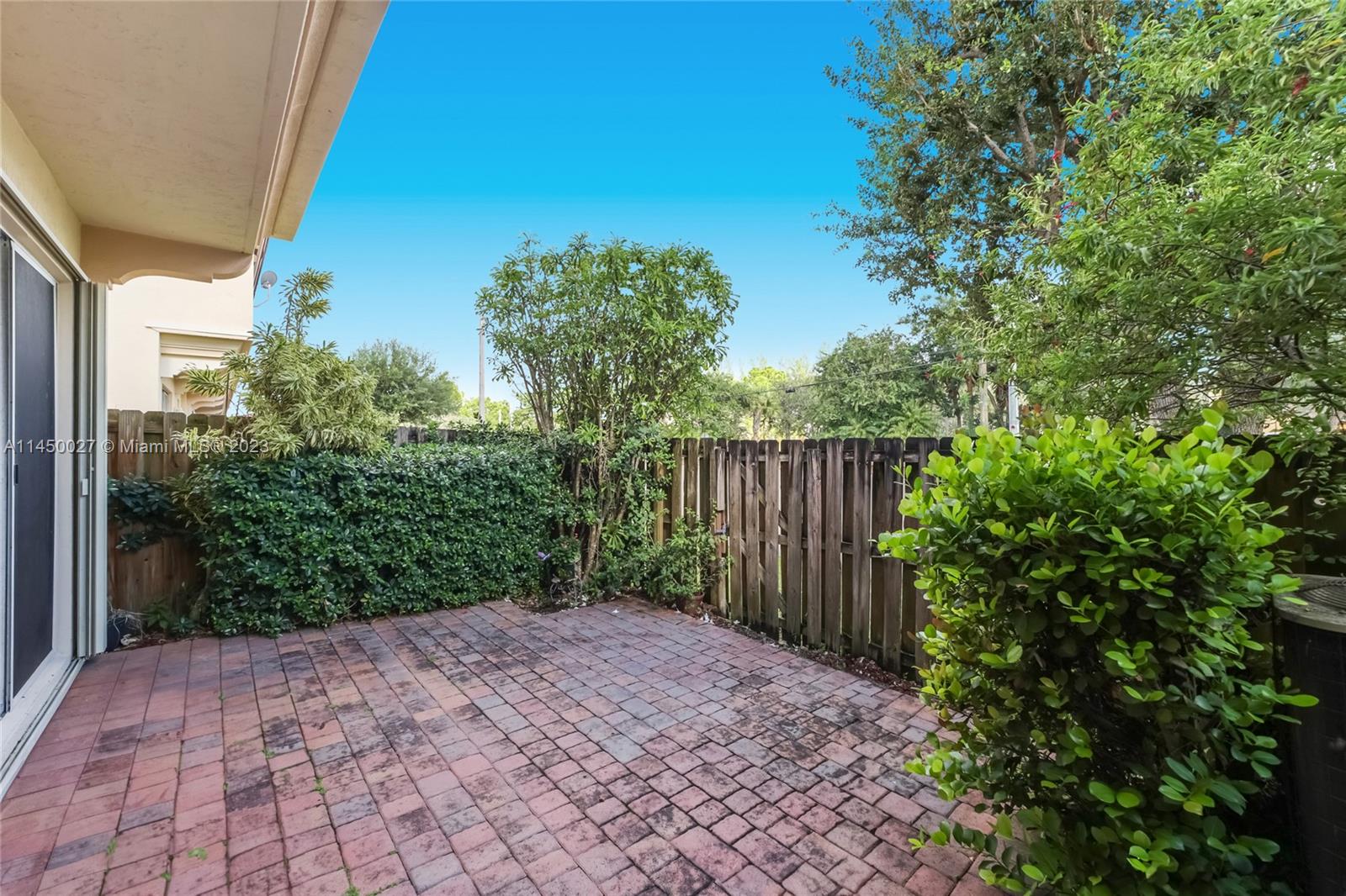 12953 Southwest 132nd Terrace Miami, FL 33186 - Photo 14 of 36 a view of a backyard with pathway