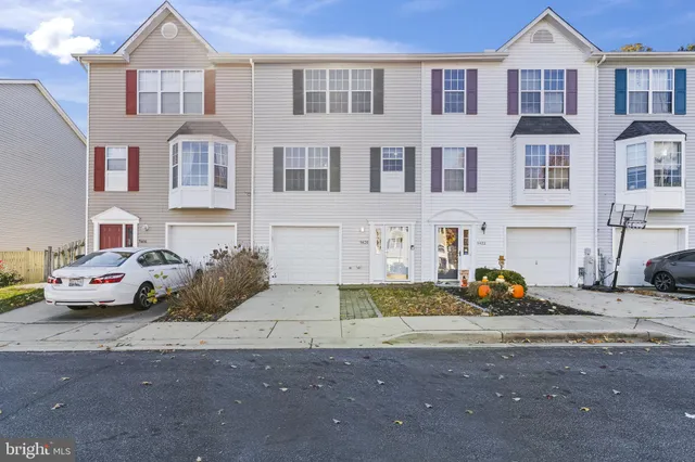 a cars parked in front of a brick building