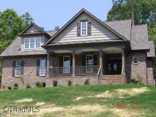 8440 Alice Player Drive Oak Ridge, NC 27310 - Photo 1 of 9 Exterior Front.