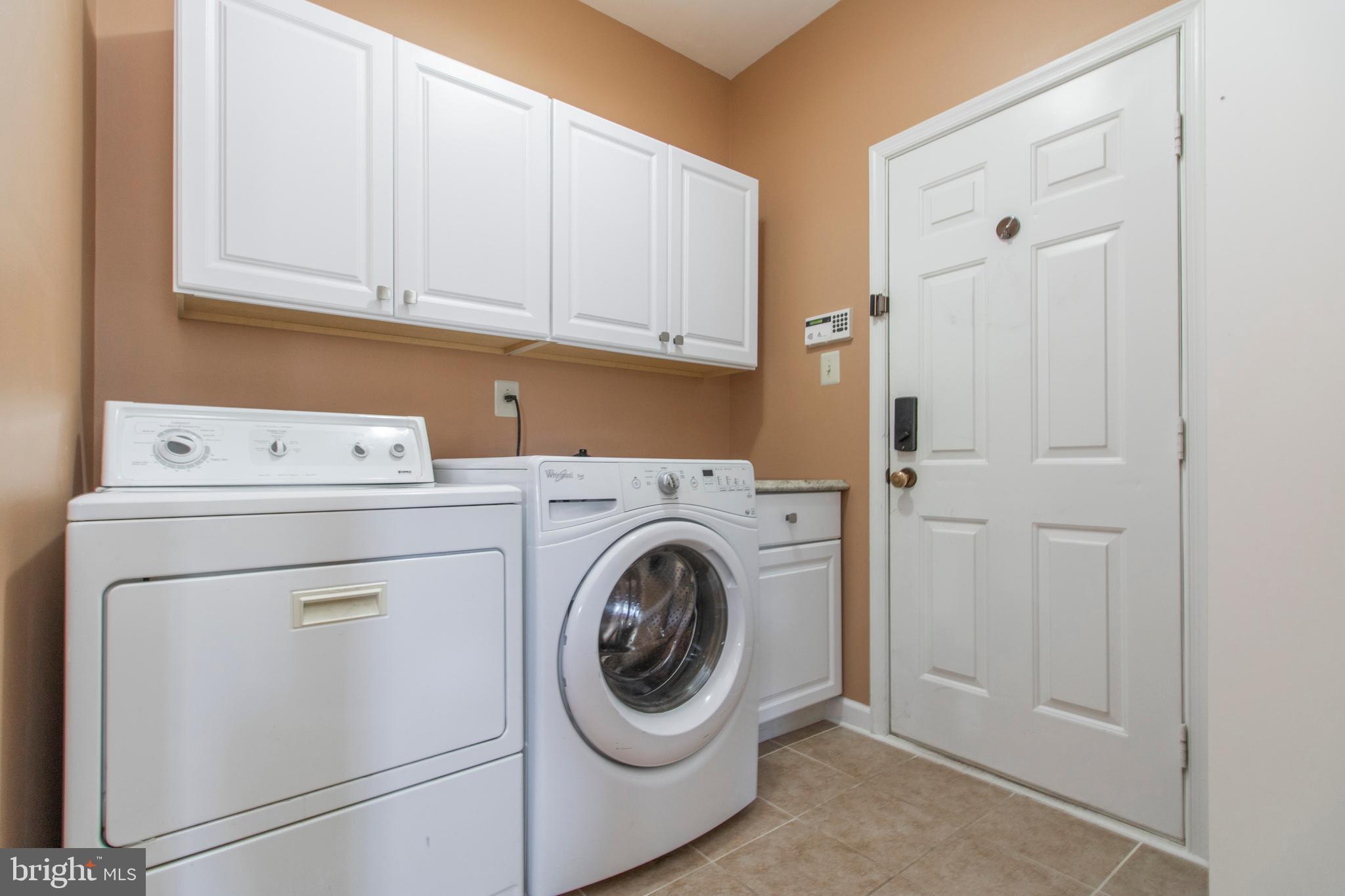 144 Statesman Road Chalfont, PA 18914 - Photo 25 of 70 Laundry exits to 2 car garage