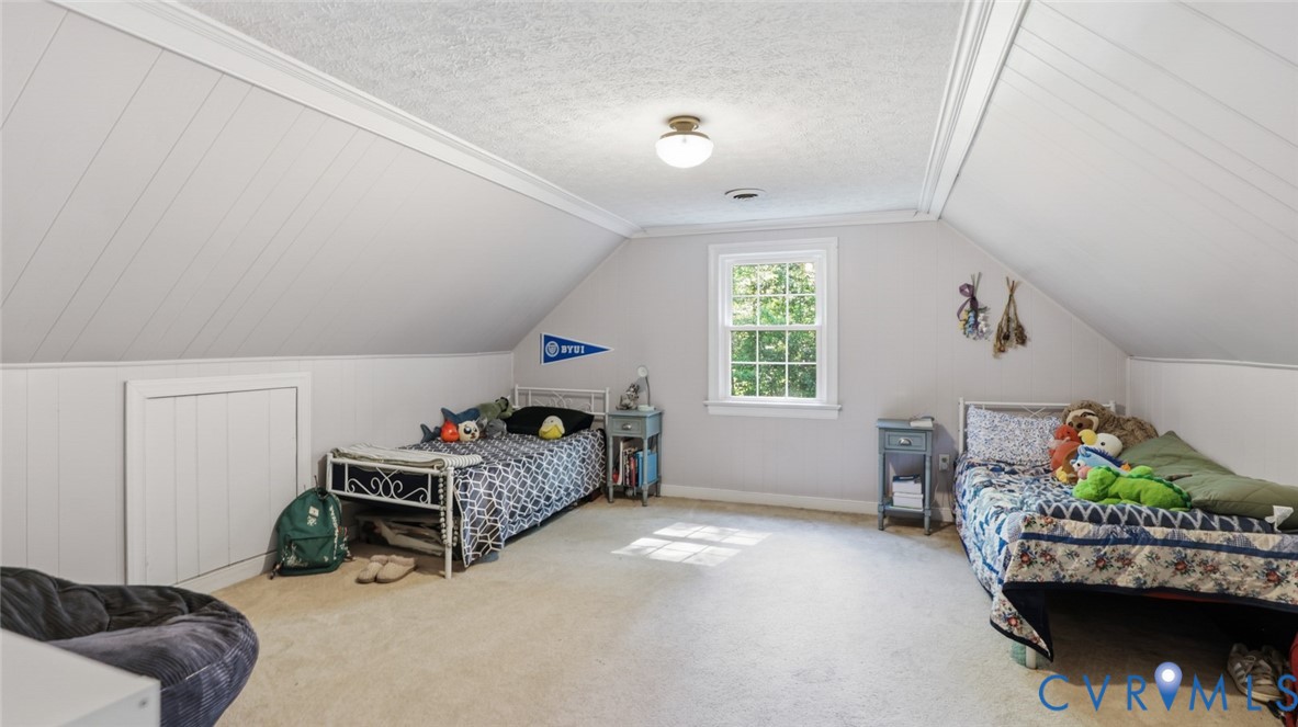 10716 Chalkley Road Richmond, VA 23237 - Photo 36 of 46 a bedroom with furniture and a bed