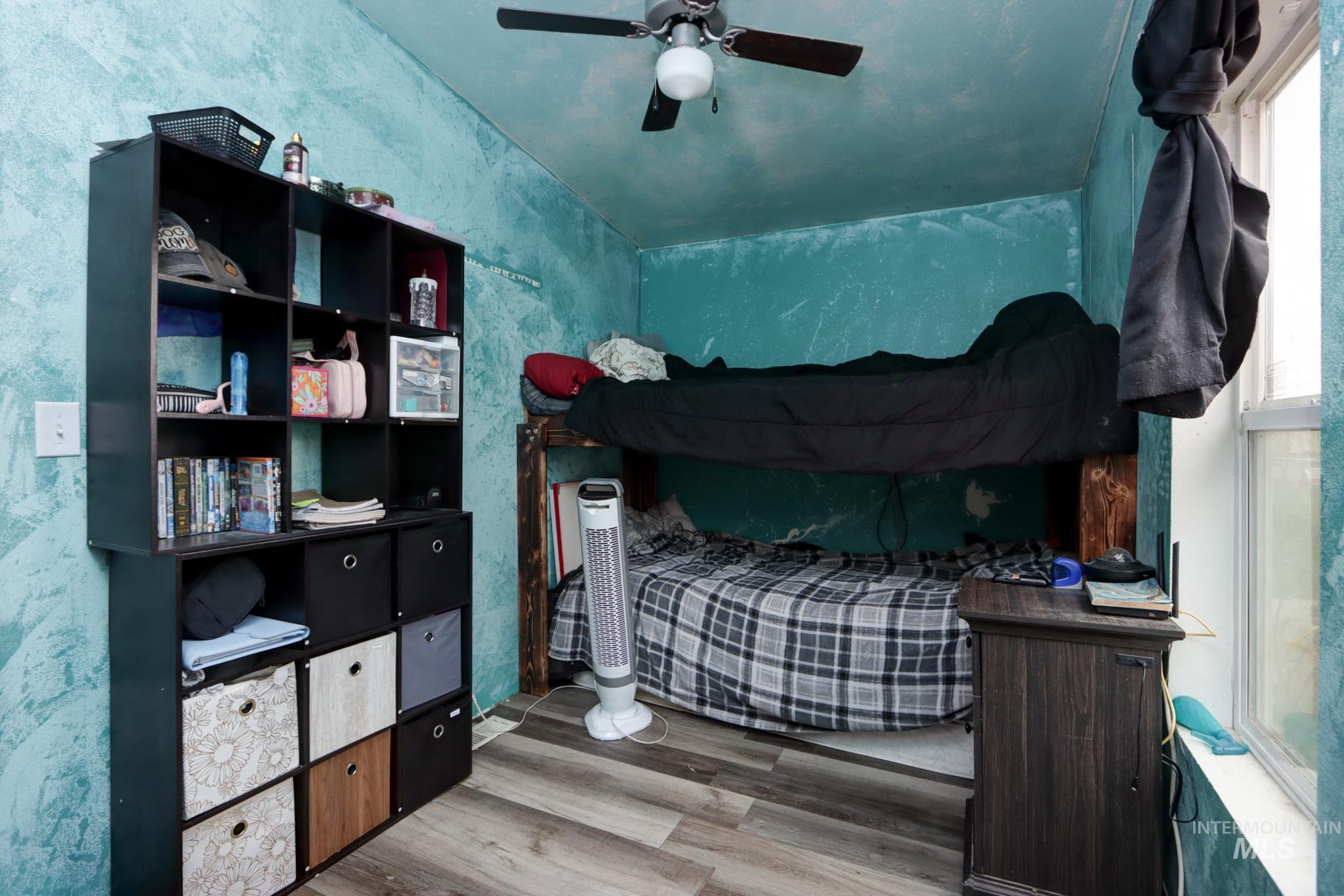 1583 Dustin Lane Vale, OR 97918 - Photo 23 of 39 Bedroom featuring light wood-type flooring and a ceiling fan
