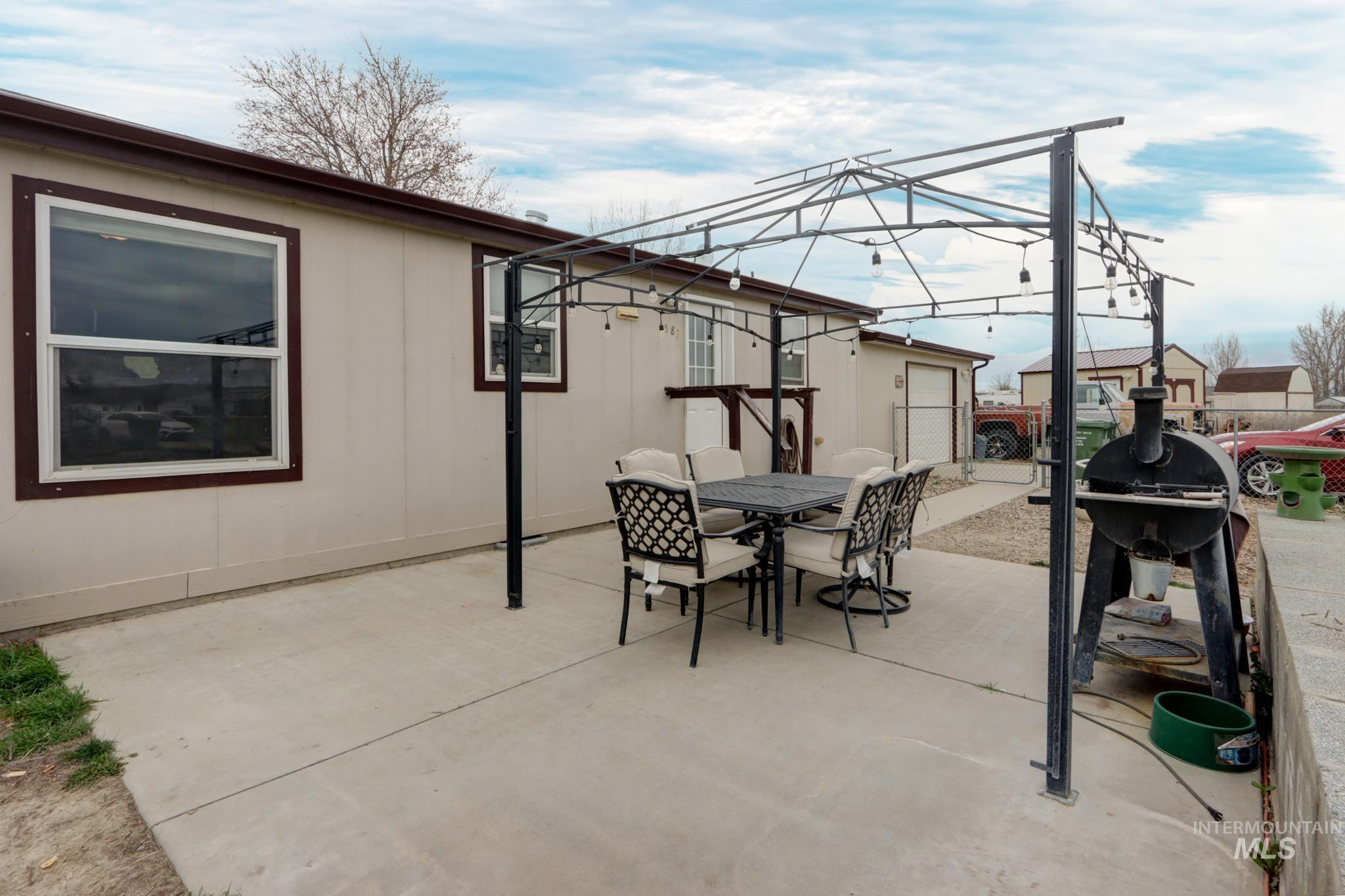 1583 Dustin Lane Vale, OR 97918 - Photo 29 of 39 View of patio featuring outdoor dining area and grilling area