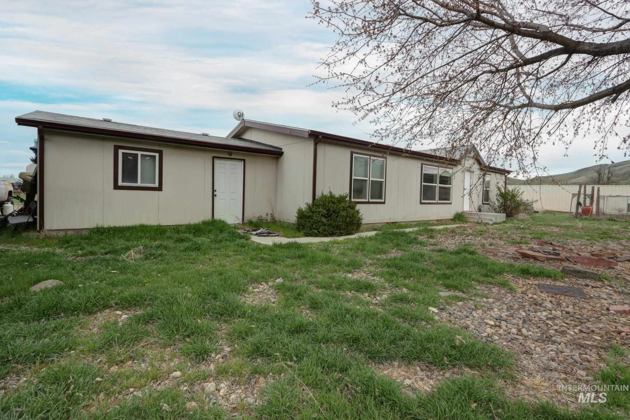 1583 Dustin Lane Vale, OR 97918 - Photo 33 of 39 Back of house with a lawn