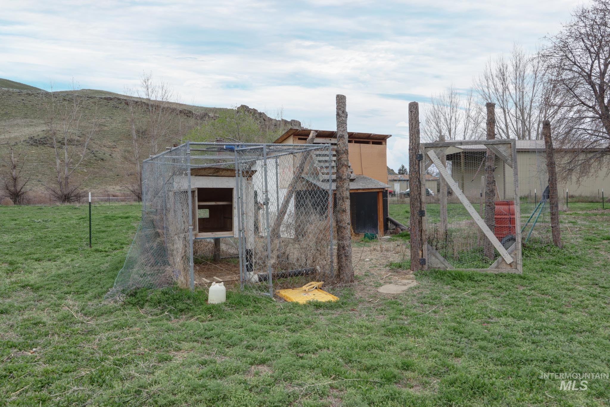 1583 Dustin Lane Vale, OR 97918 - Photo 38 of 39 View of chicken coop featuring a yard and a view of countryside