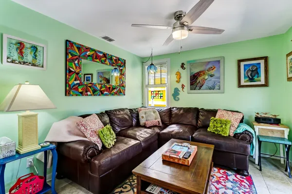 a living room with furniture and a couch