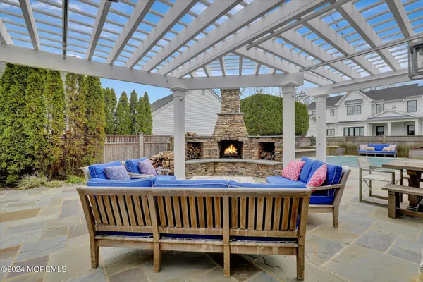 a view of a chairs and tables in patio of the house