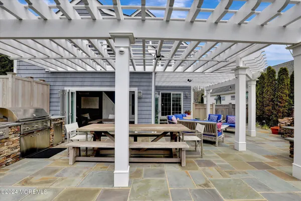 a front view of a house and garden