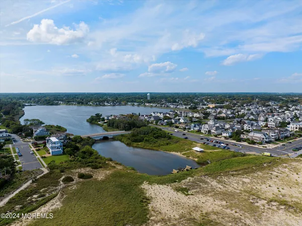 a picture of a wall with a white wall and a white refrigerator