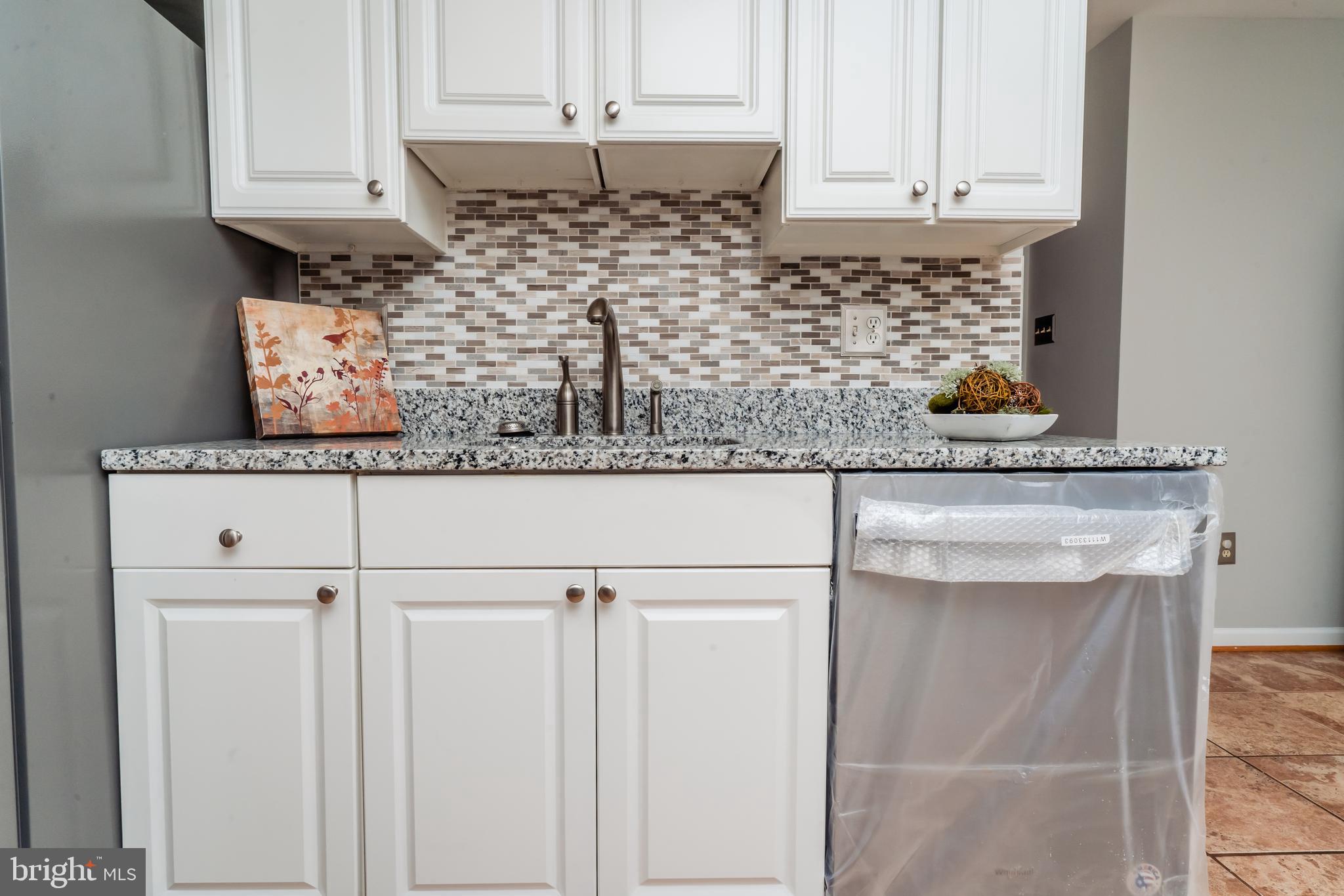 1110 Gresham Road Silver Spring, MD 20904 - Photo 18 of 75 Granite Counters and Gorgeous Backsplash
