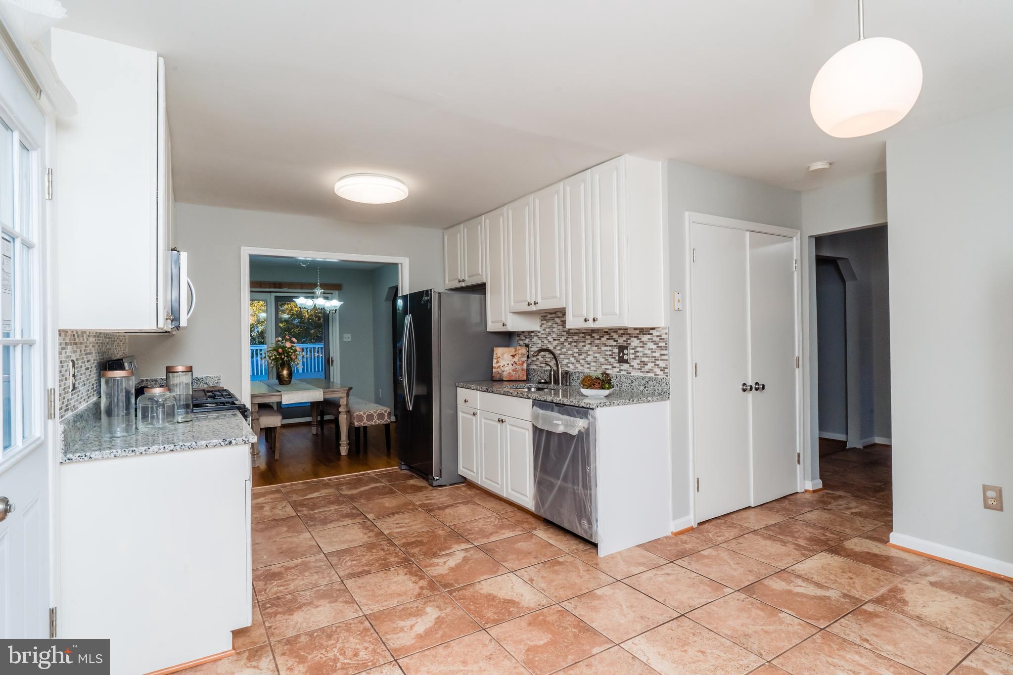 1110 Gresham Road Silver Spring, MD 20904 - Photo 23 of 75 Kitchen flows into a Formal Dining Area.