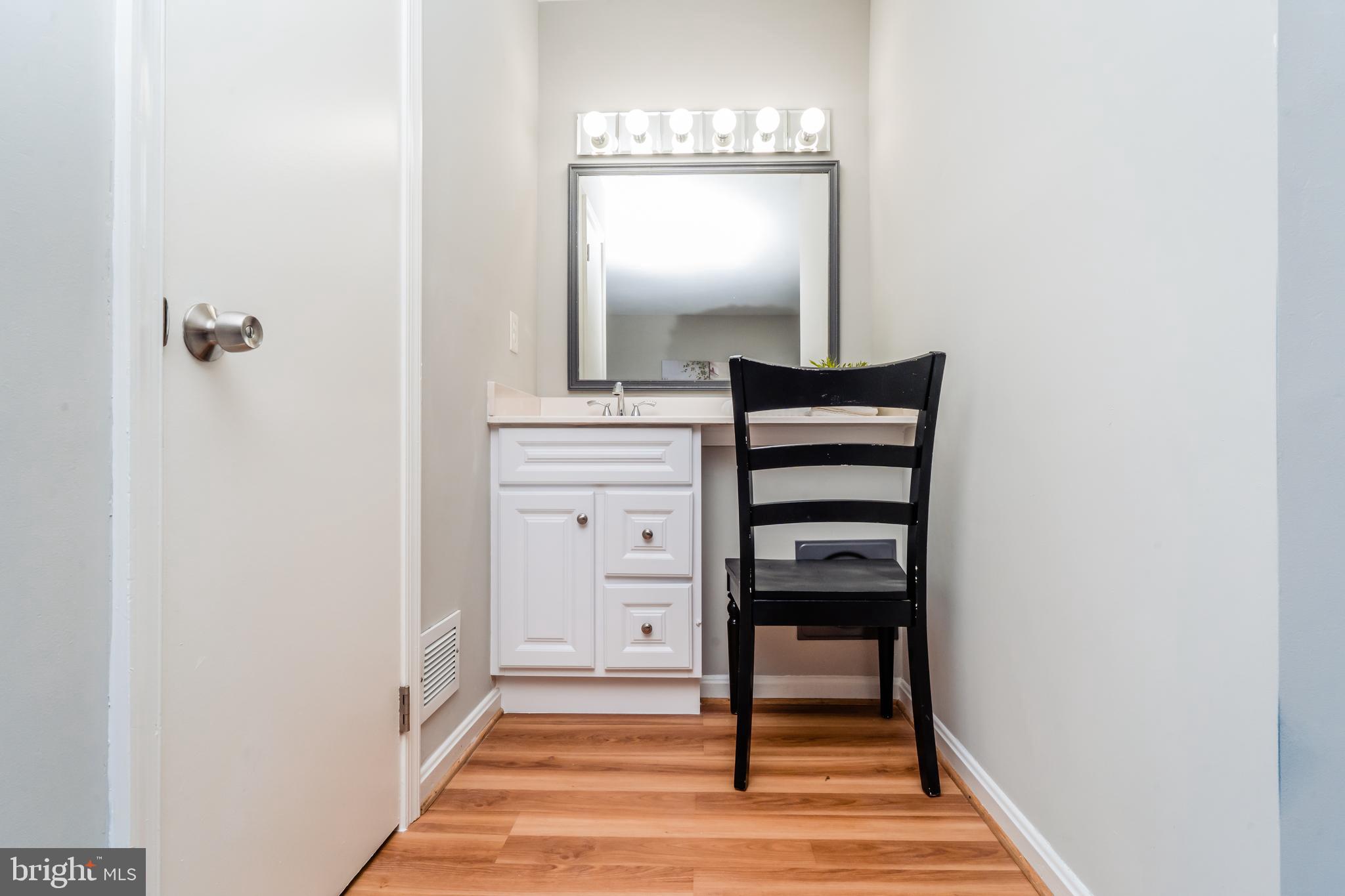 1110 Gresham Road Silver Spring, MD 20904 - Photo 36 of 75 1 Of 2 Vanities with Laundry Shute Beneath.
