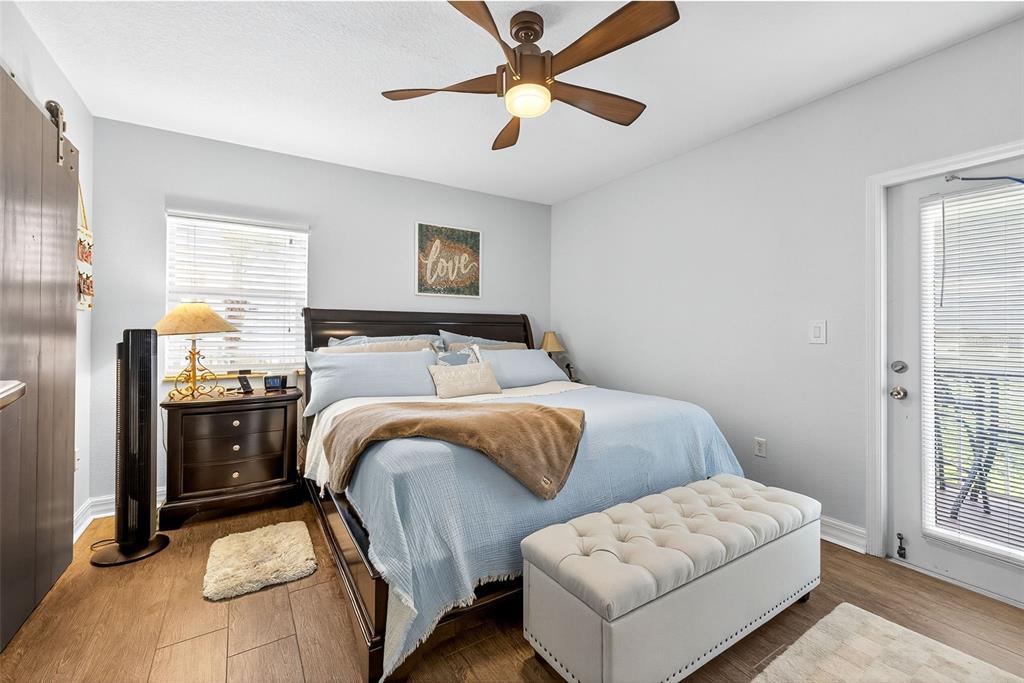 4516 Seagull Drive, Unit 519 New Port Richey, FL 34652 - Photo 22 of 54 a bedroom with bed and window