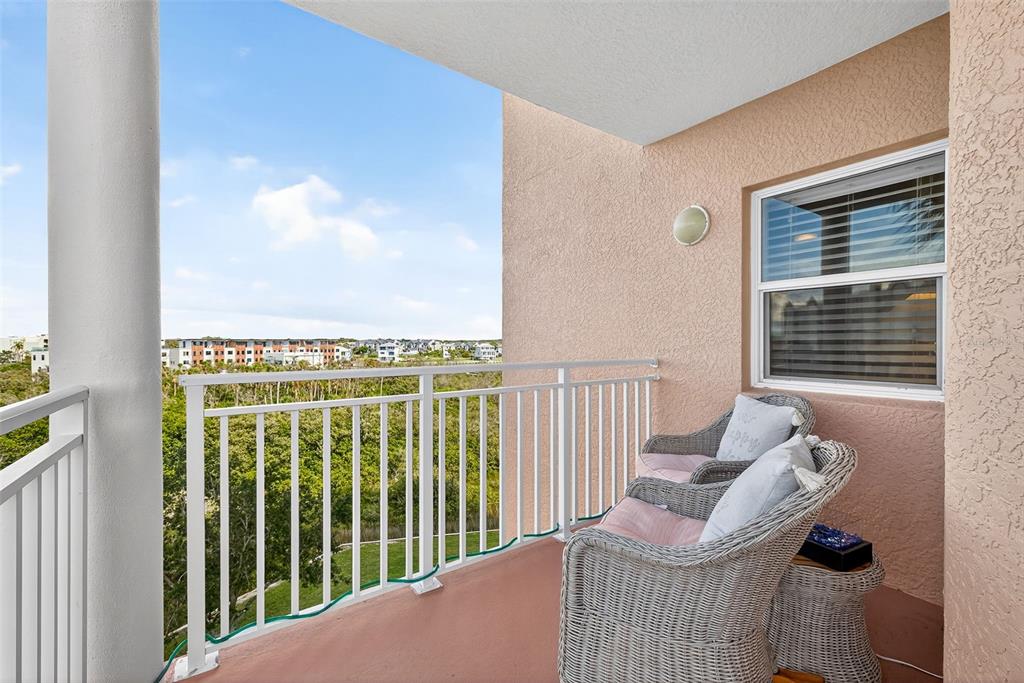4516 Seagull Drive, Unit 519 New Port Richey, FL 34652 - Photo 30 of 54 a view of balcony with furniture