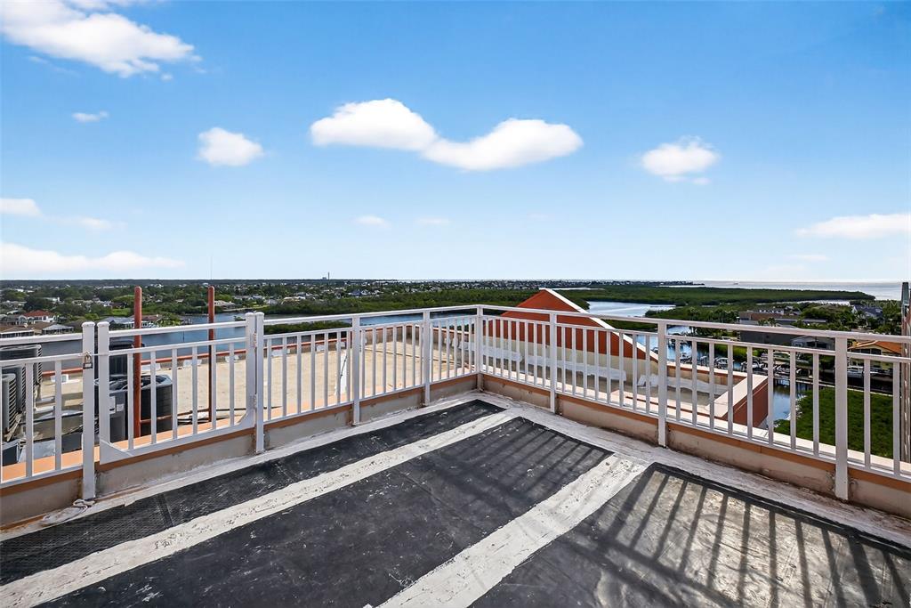 4516 Seagull Drive, Unit 519 New Port Richey, FL 34652 - Photo 38 of 54 a view of balcony with wooden floor