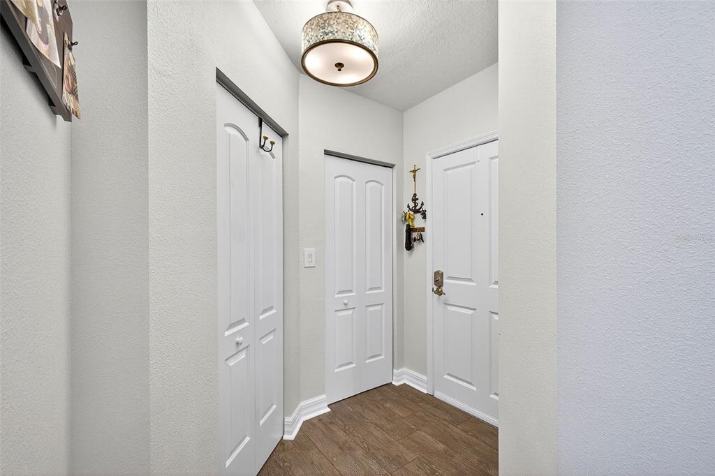 4516 Seagull Drive, Unit 519 New Port Richey, FL 34652 - Photo 9 of 54 a view of a room with wooden floor