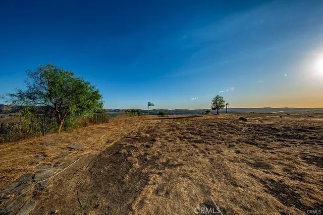 a view of a road with an ocean view