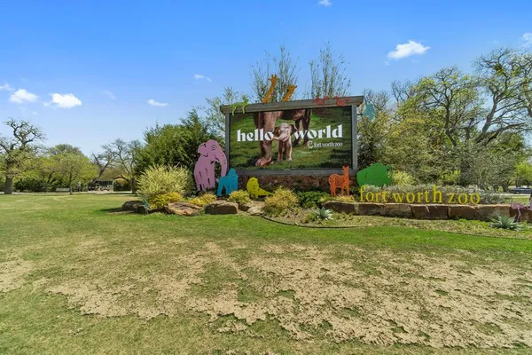 a view of a park with welcome board