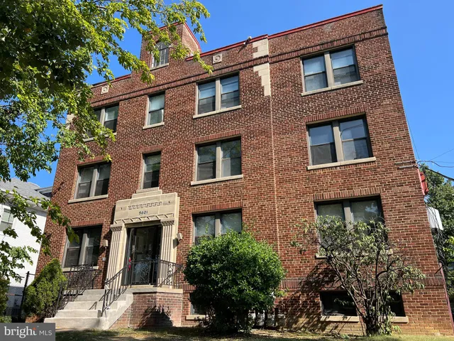 a front view of a multi story residential apartment building