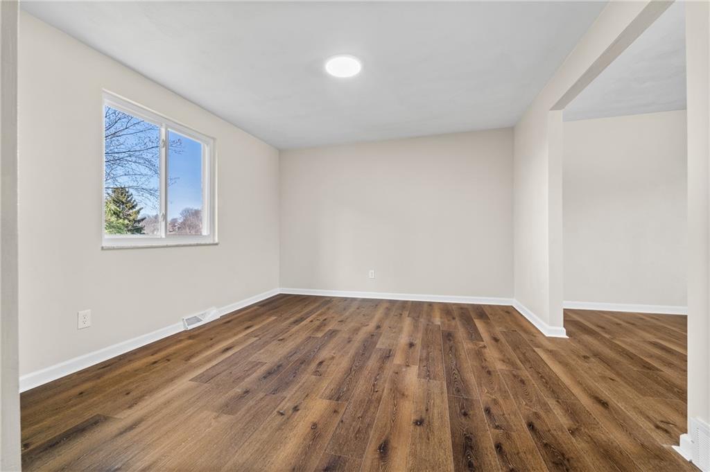 10 Rushmore Drive Pittsburgh, PA 15235 - Photo 13 of 37 an empty room with wooden floor and windows