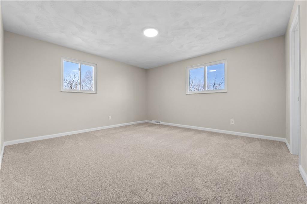 10 Rushmore Drive Pittsburgh, PA 15235 - Photo 23 of 37 an empty room with a workbench