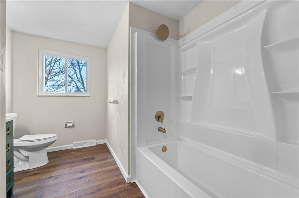10 Rushmore Drive Pittsburgh, PA 15235 - Photo 29 of 37 a view of a bathroom with a tub and toilet