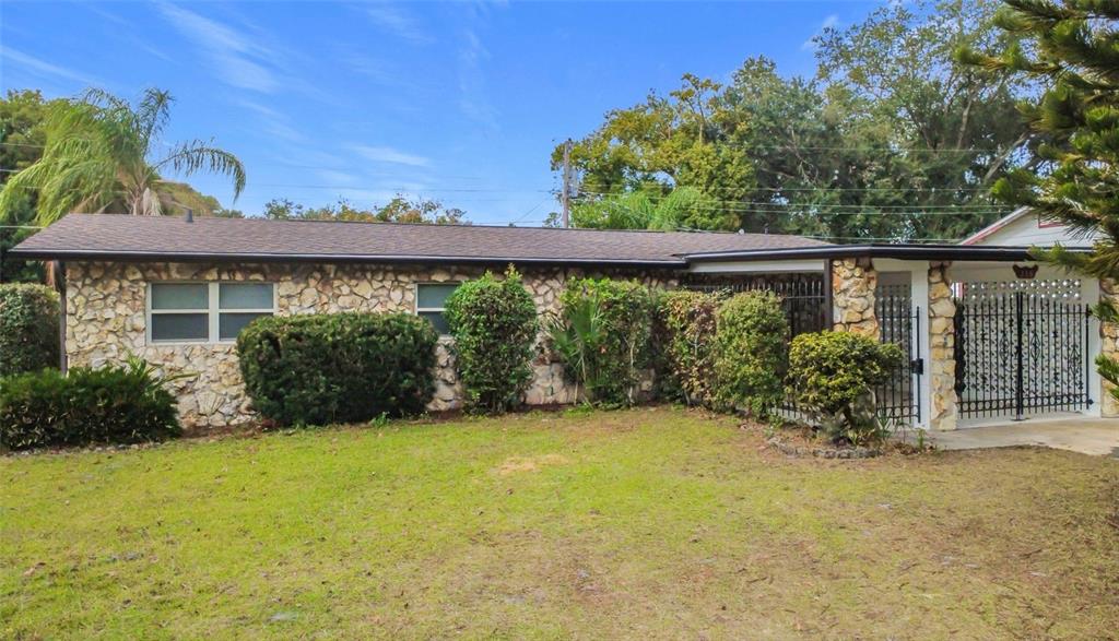 116 Exeter Avenue Longwood, FL 32750 - Photo 1 of 21 a view of a garden with an outdoor seating