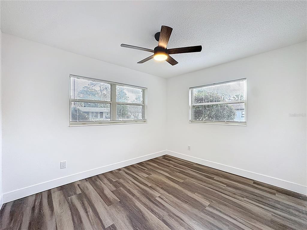 116 Exeter Avenue Longwood, FL 32750 - Photo 16 of 21 a view of empty room with wooden floor