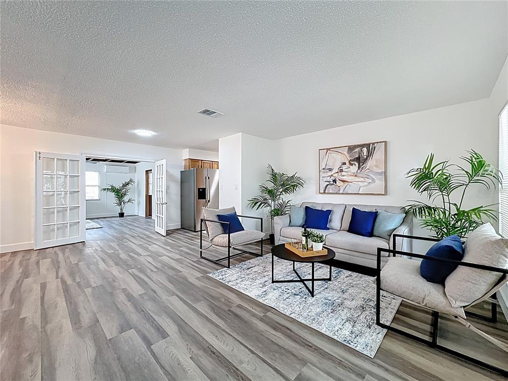 116 Exeter Avenue Longwood, FL 32750 - Photo 2 of 21 a living room with furniture and wooden floor