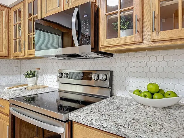 a kitchen with a stove and a sink