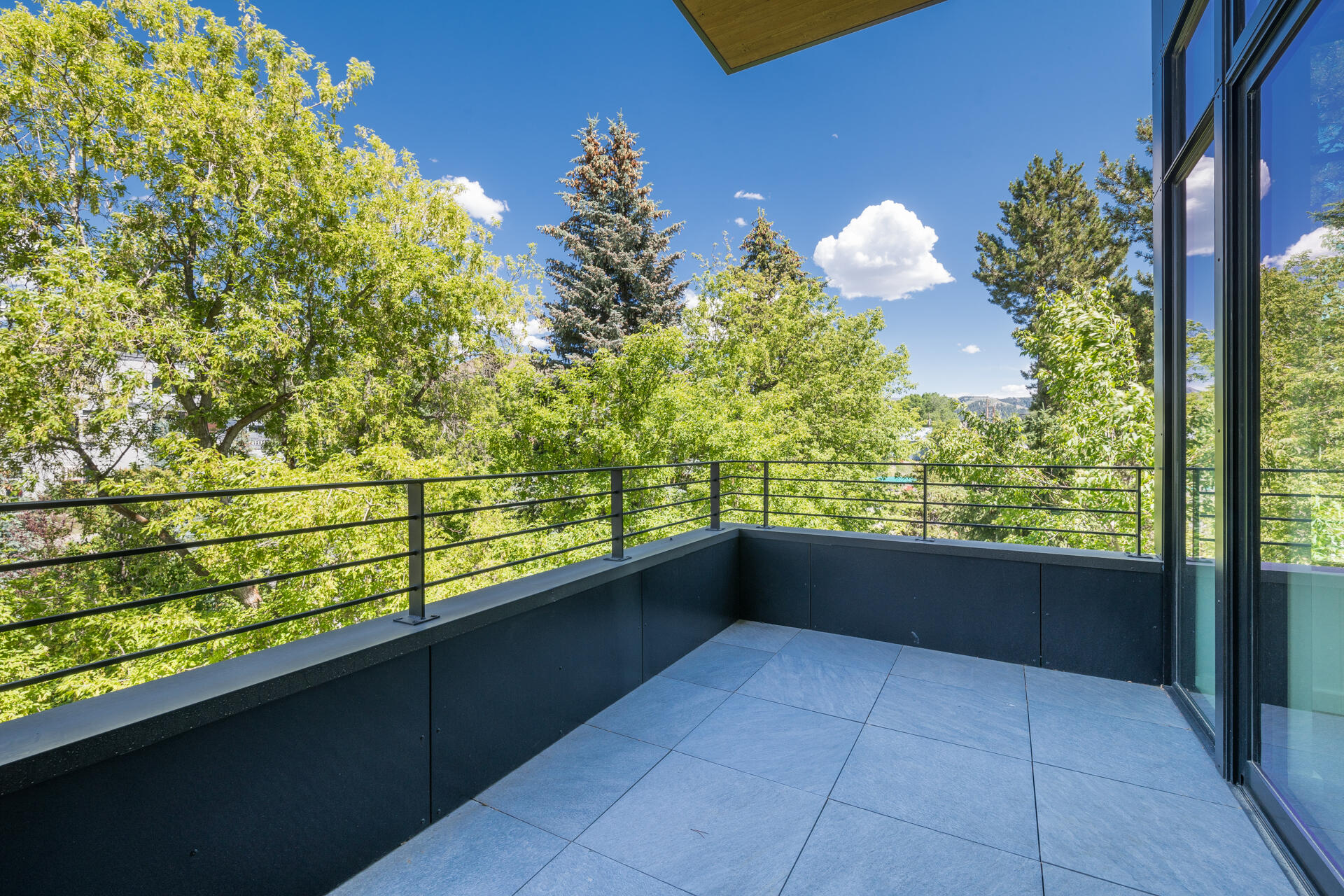 760 North Washington, Unit 301 Ketchum, ID 83340 - Photo 28 of 39 Deck off bedrooms 2 and 3