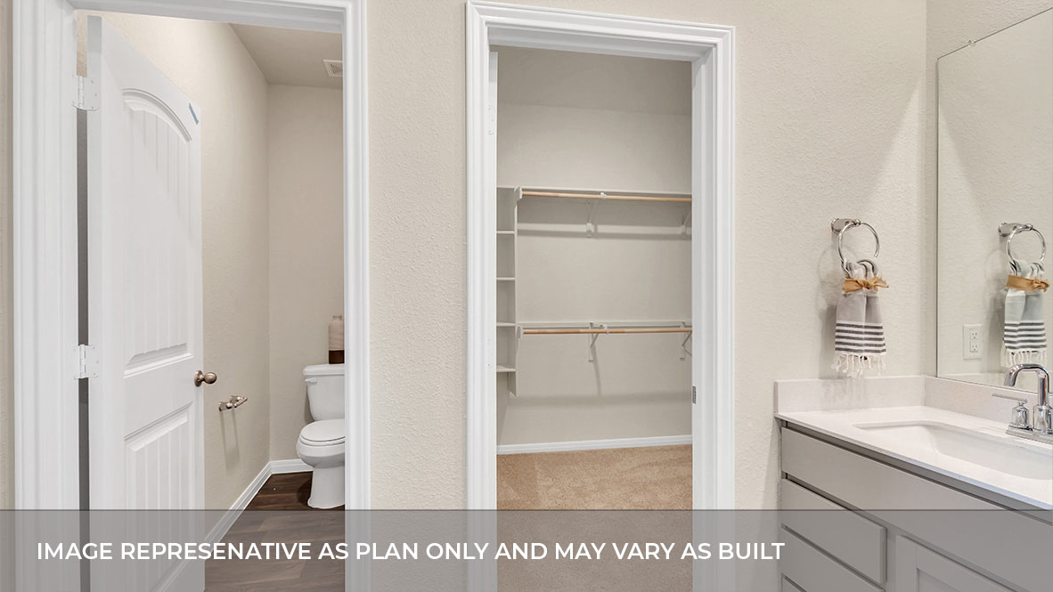 183 Balmorhea Street Kyle, TX 78640 - Photo 27 of 34 a bathroom with a sink a mirror and a shower