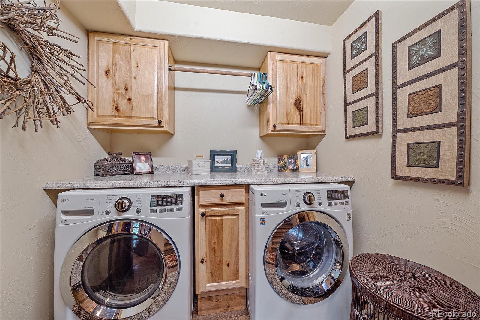 2894 County Road 43 Bailey, CO 80421 - Photo 27 of 48 a utility room with dryer and washer