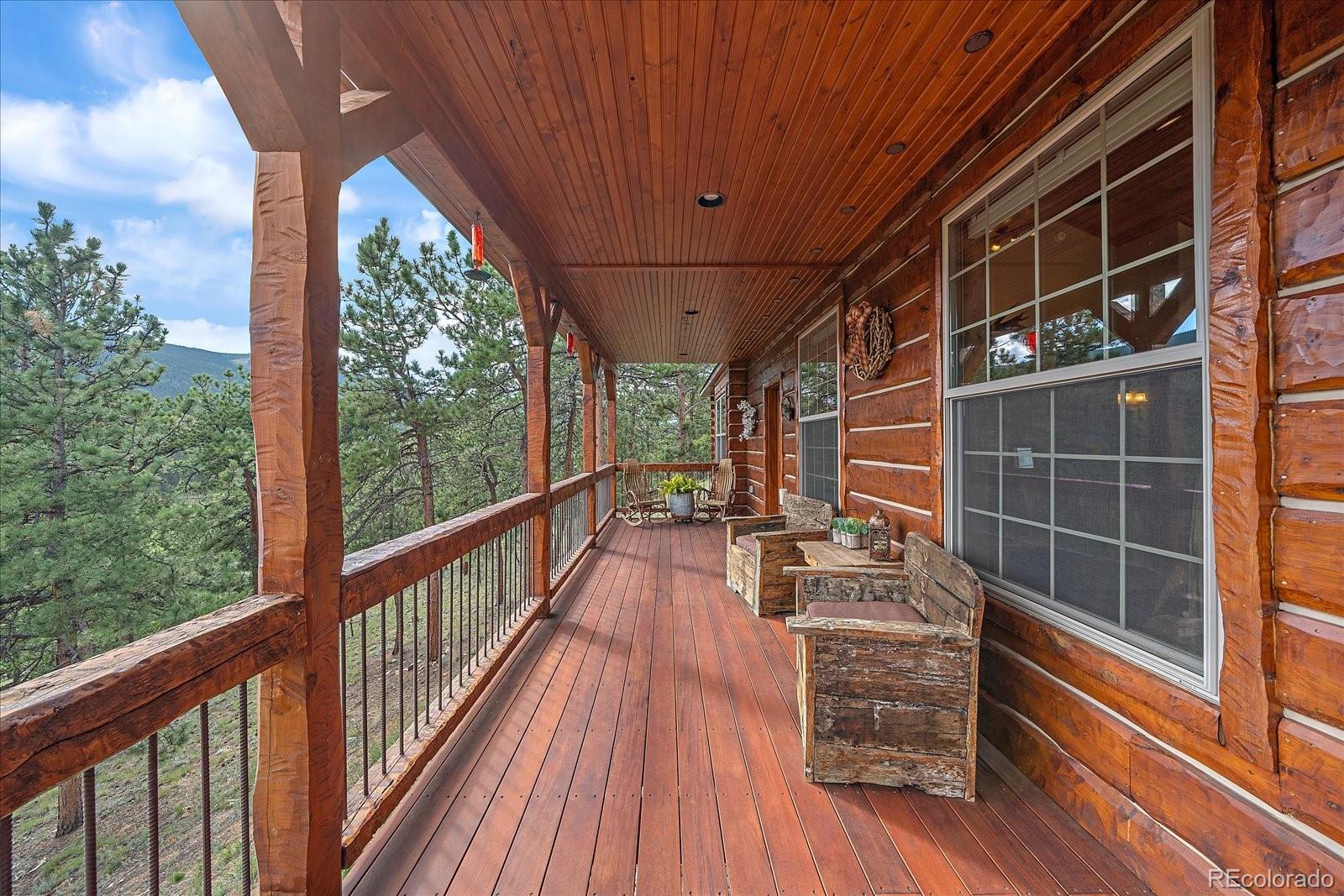 2894 County Road 43 Bailey, CO 80421 - Photo 29 of 48 a view of a balcony with wooden floor