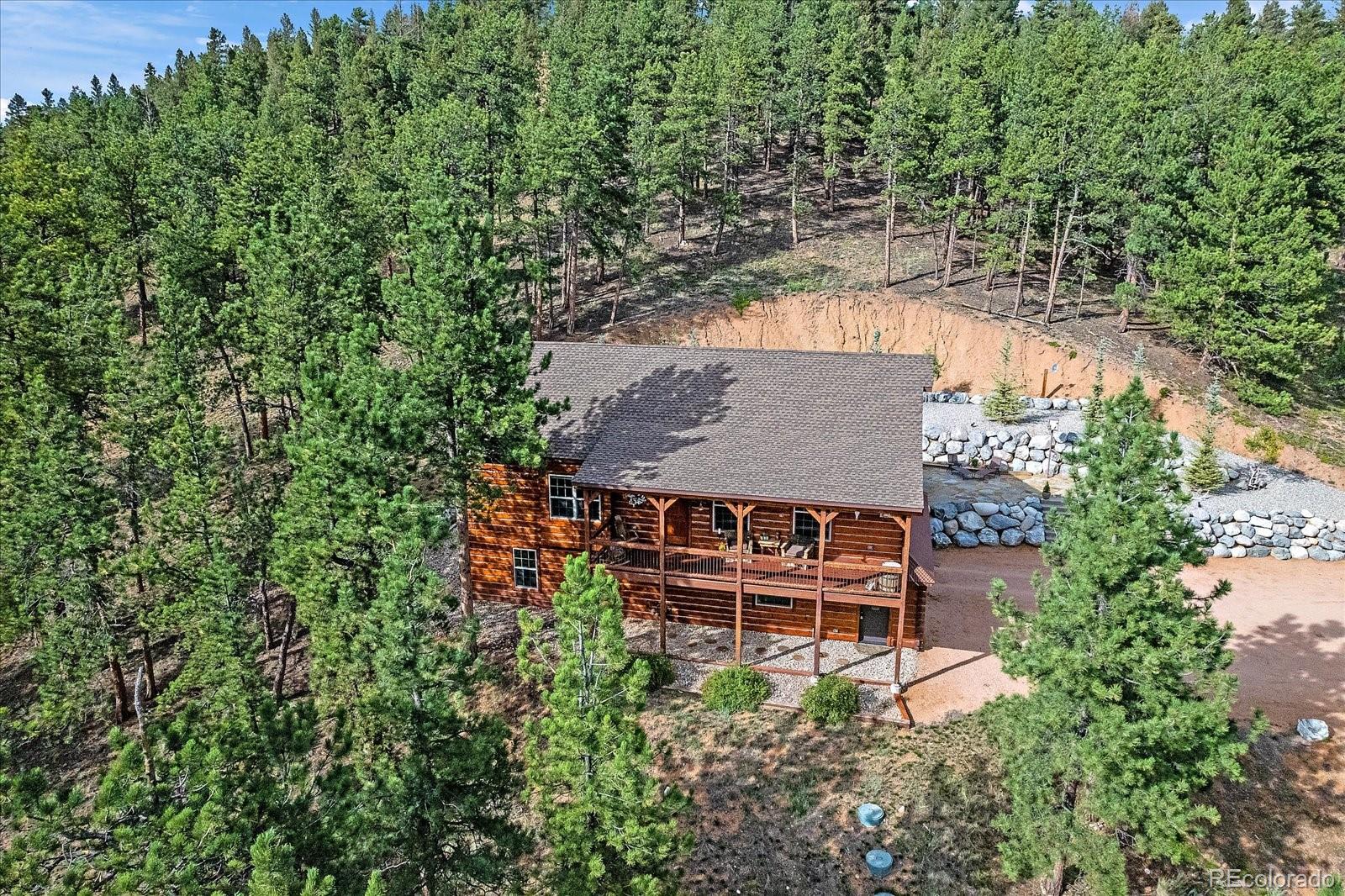 2894 County Road 43 Bailey, CO 80421 - Photo 39 of 48 an aerial view of a house with yard and outdoor seating