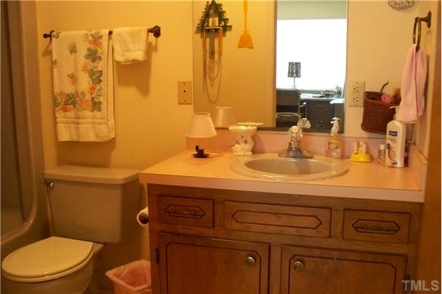 760 Webb Road Dunn, NC 28334 - Photo 8 of 12 Guest bathroom has tub/shower
