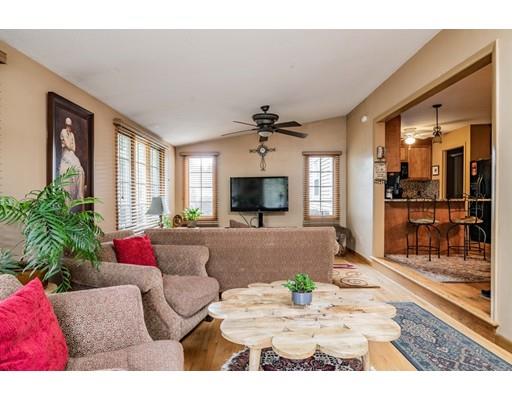 309 Frank Smith Road Longmeadow, MA 01106 - Photo 13 of 41 a living room with furniture and a fireplace