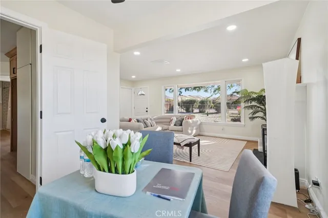 a kitchen with a stove a sink and cabinets