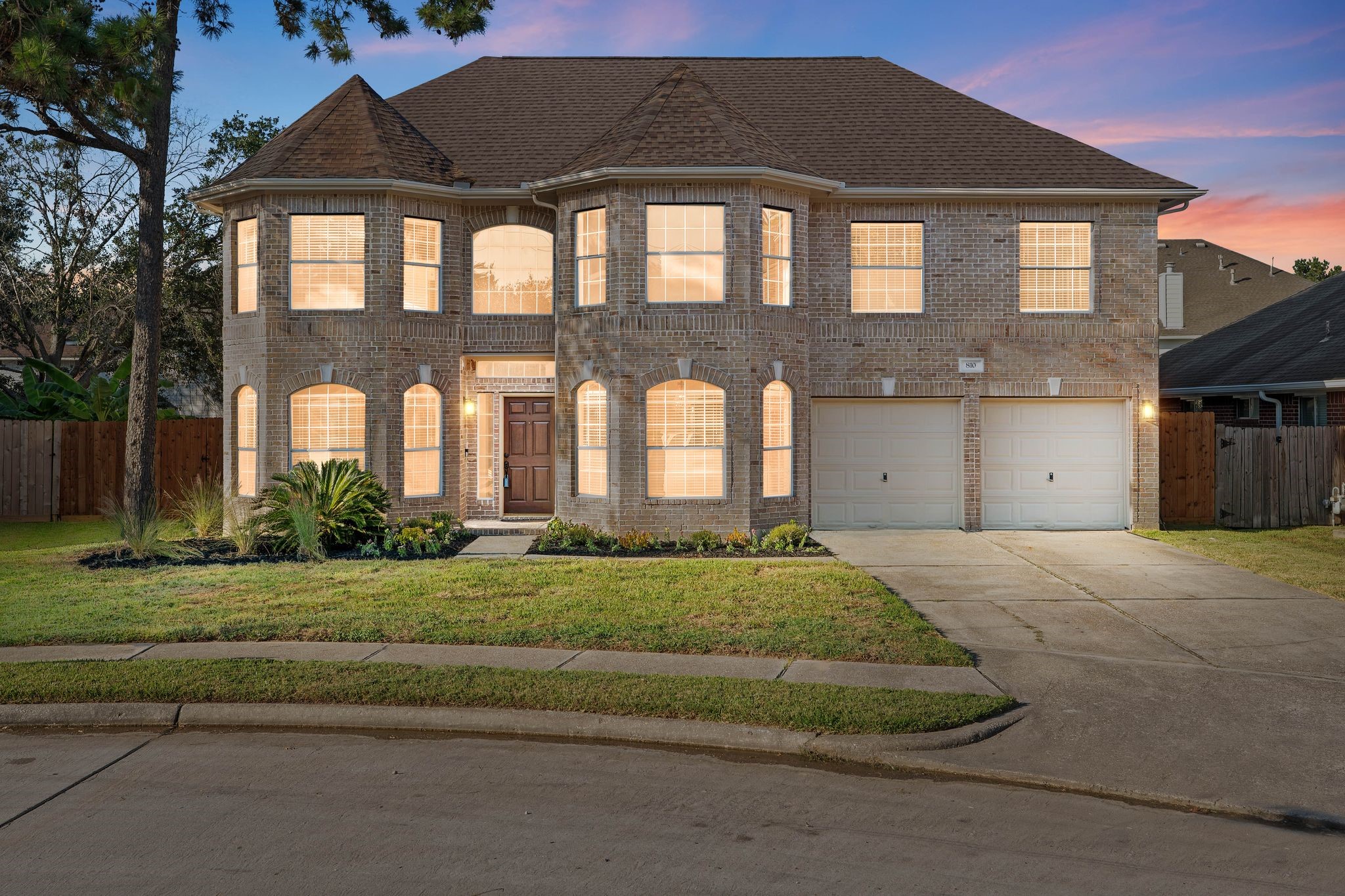 810 Flanners Court Spring, TX 77373 - Photo 2 of 46 a front view of a house with a yard