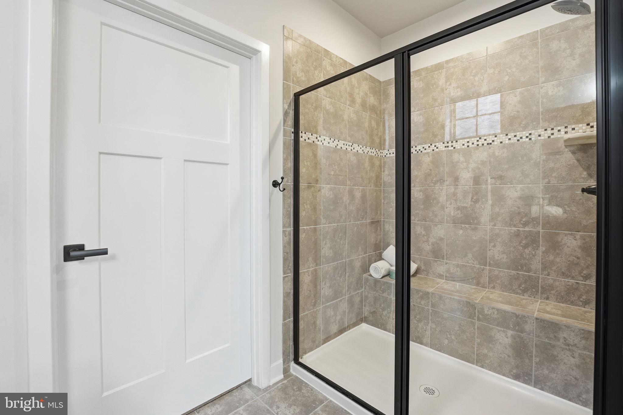 2252 Red Pine Loop Dumfries, VA 22026 - Photo 23 of 87 walk-in shower with bench