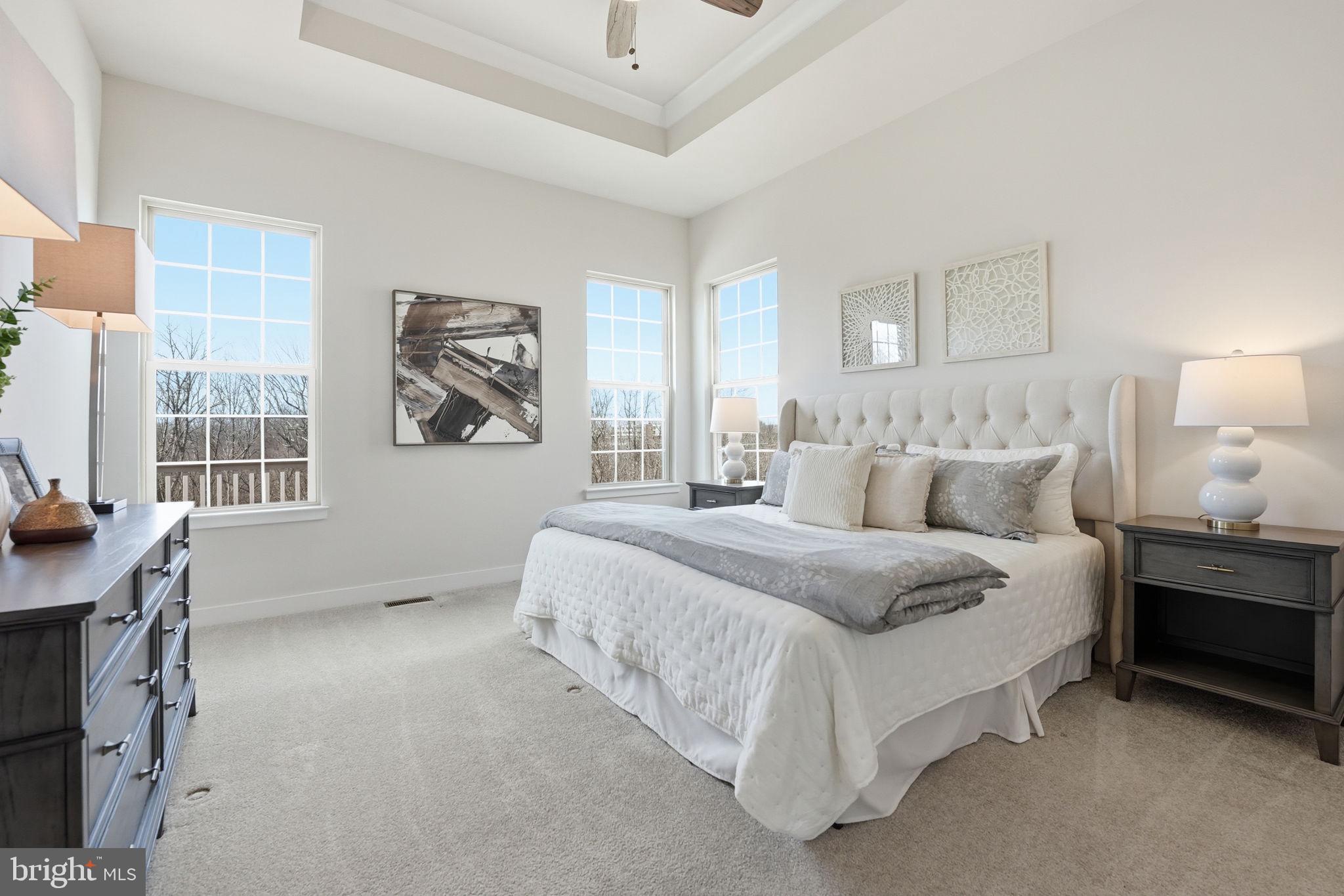 2252 Red Pine Loop Dumfries, VA 22026 - Photo 39 of 117 a spacious bedroom with a bed and a window