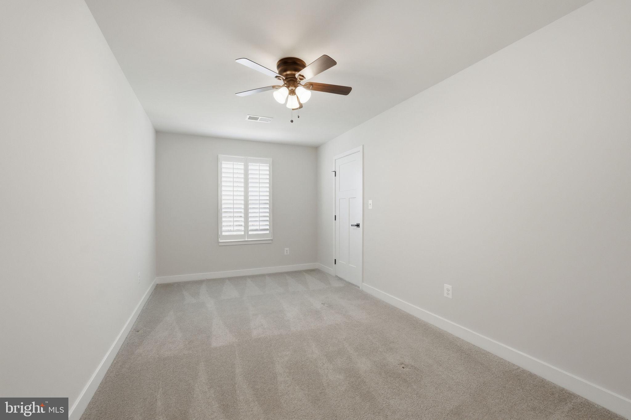 2252 Red Pine Loop Dumfries, VA 22026 - Photo 40 of 87 Bedroom 2 with plantation shutter