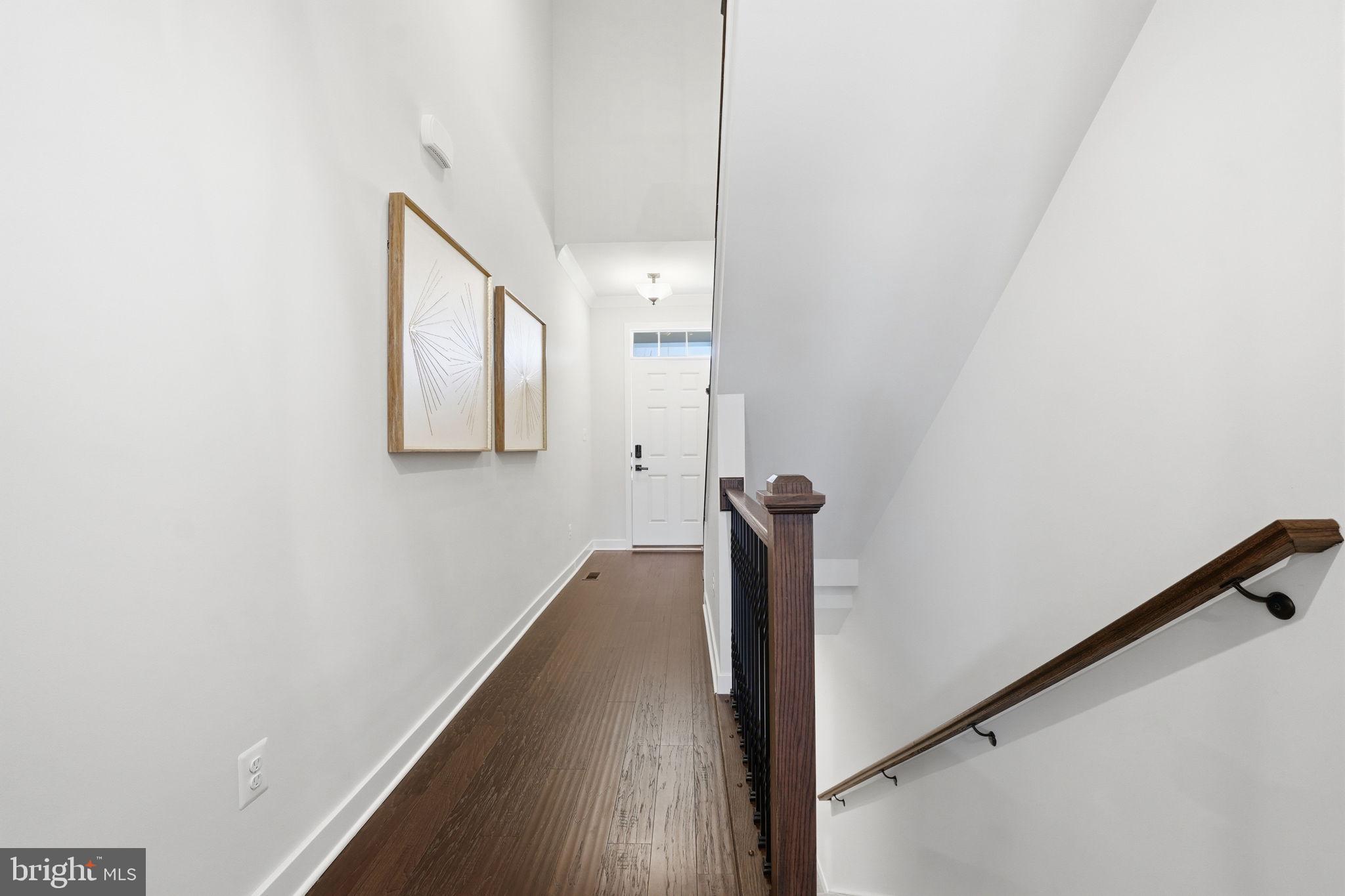 2252 Red Pine Loop Dumfries, VA 22026 - Photo 40 of 84 Foyer and main level hallway