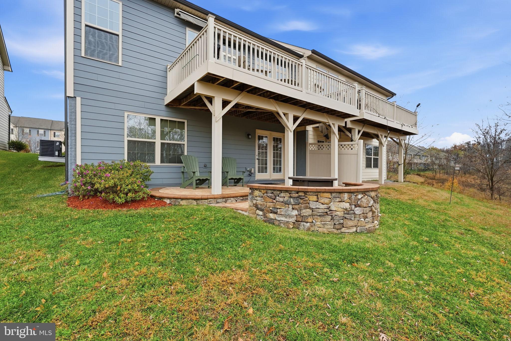 2252 Red Pine Loop Dumfries, VA 22026 - Photo 5 of 117 a front view of a house with garden
