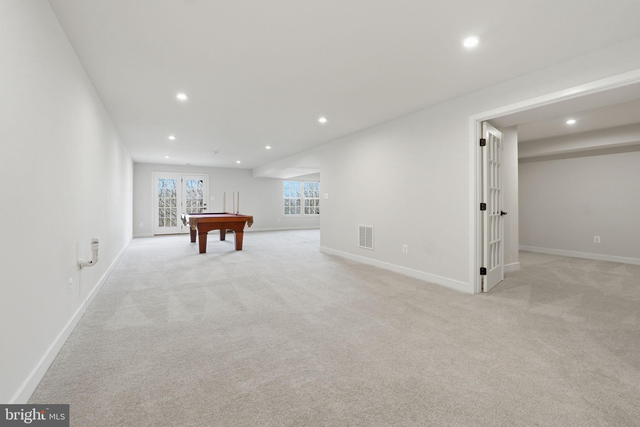 2252 Red Pine Loop Dumfries, VA 22026 - Photo 47 of 87 French doors into media room