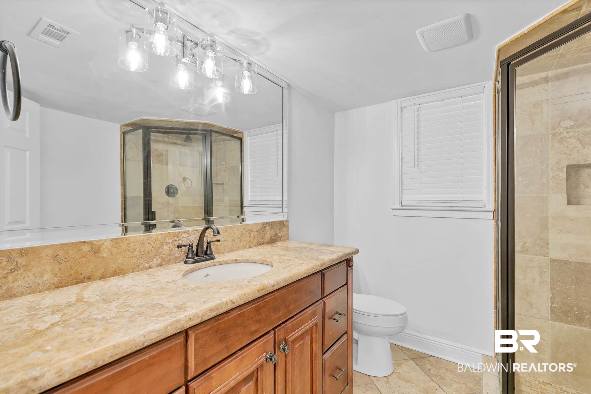 4705 Sherry Court Mobile, AL 36693 - Photo 23 of 100 Full bath featuring vanity, a shower stall, and light tile patterned floors