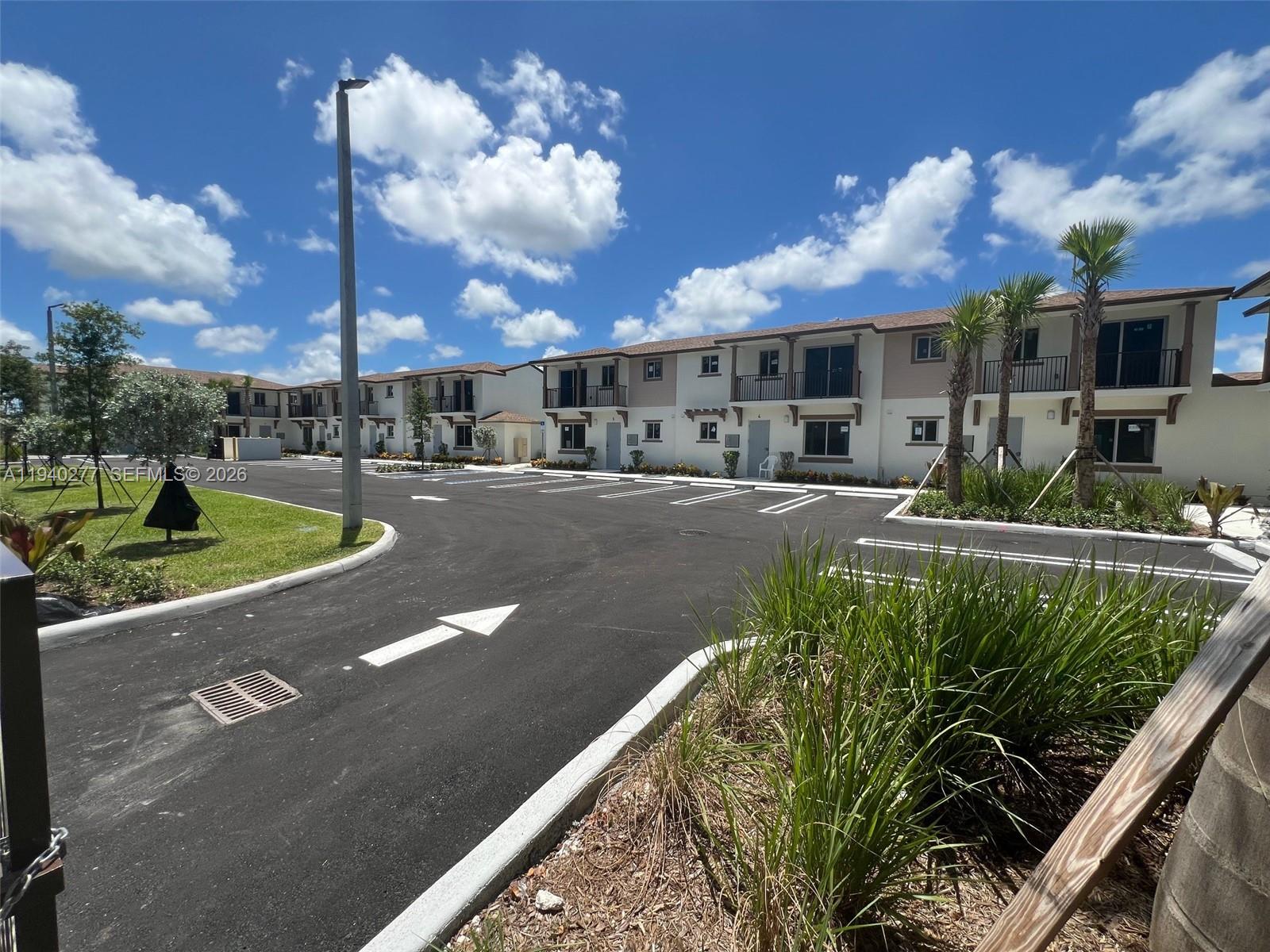 199 Redland Road, Unit A10 Florida City, FL 33034 - Photo 2 of 15 a view of a swimming pool with a patio