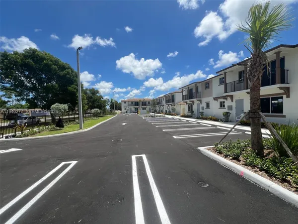 a view of a street with houses