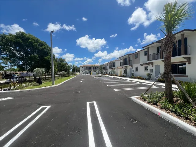 a view of a street with houses