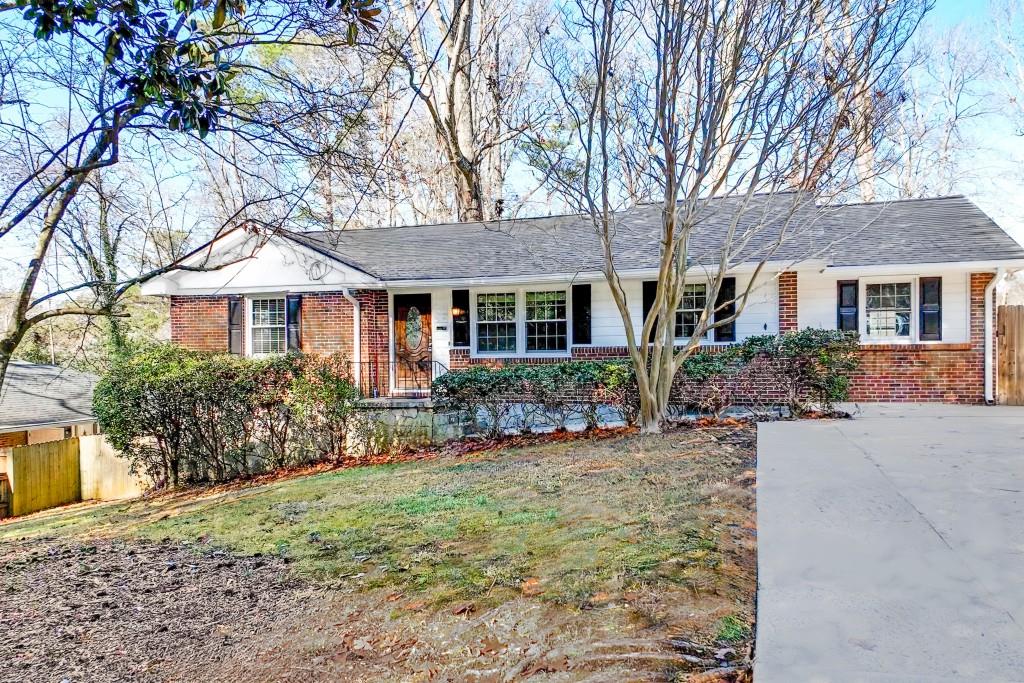 2686 Laurel Ridge Drive Decatur, GA 30033 - Photo 1 of 1 a front view of a house with garden